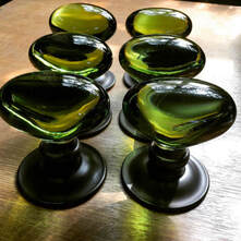 Green glass handles at Christopher Howard