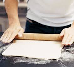 Rolling out pastry for black pudding sausage rolls